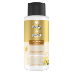 Conditionneur Love Beauty And Planet, flacon huile coco et ylang-ylang pour réparation douce des cheveux.