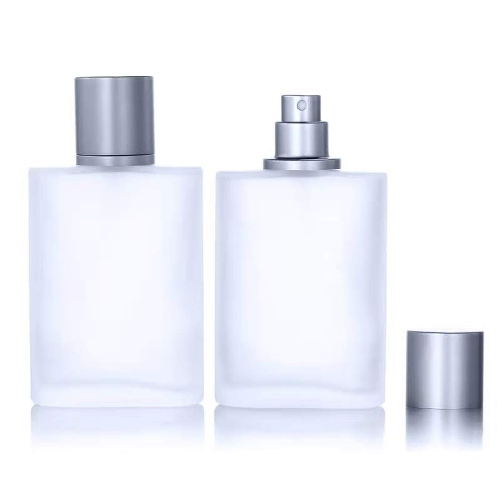 Bouteille Luojery en verre givré 100 ml, spray précis et portable.