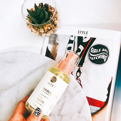 Luseta Marula Oil Hair Treatment on damp hair, smoothing and adding shine