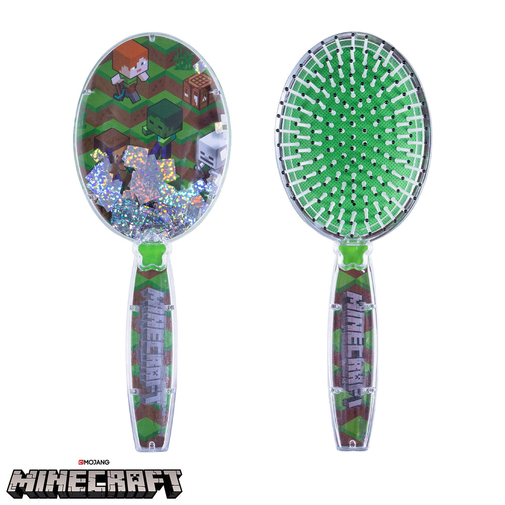 Détails cubes scintillants et confettis verts sur la brosse.