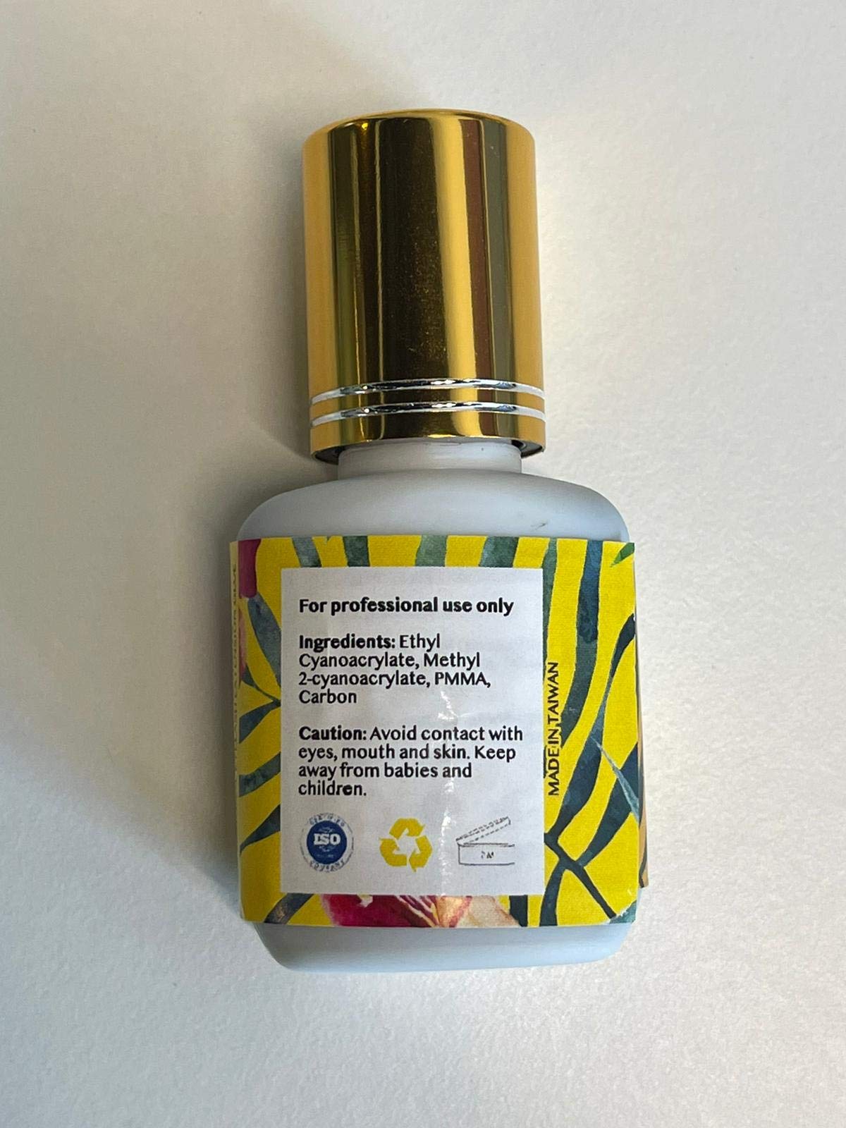 Lyon Lash glue packaging on salon display shelf
