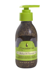Macadamia Natural Oil, huile de soin en bouteille en verre, revitalise et nourrit tous les cheveux.