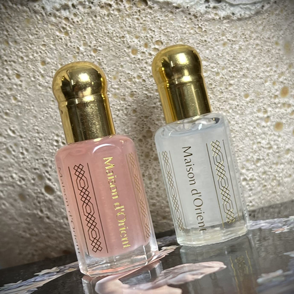 Notes boisées et ambrées de Pink Musk, sillage élégant.