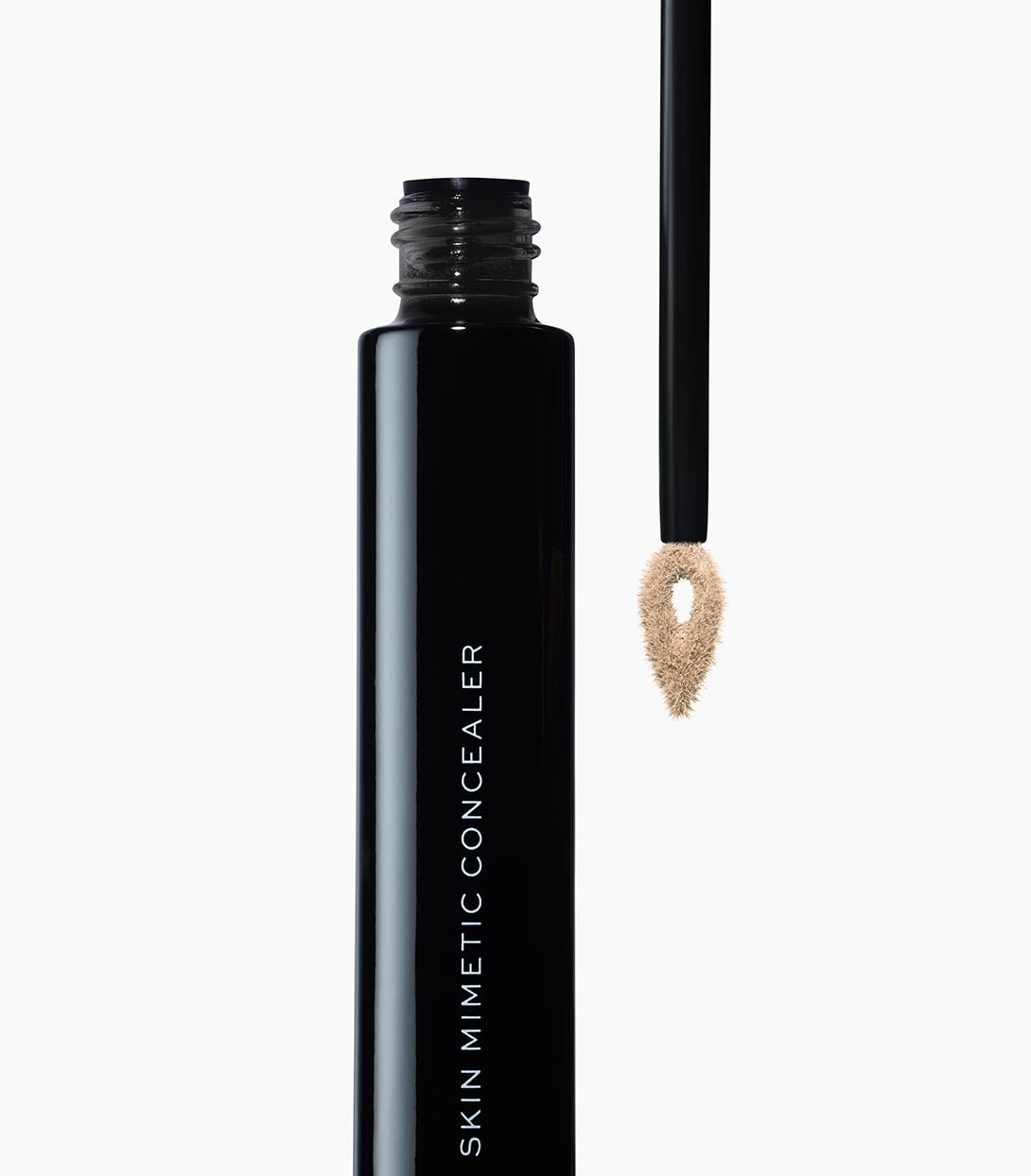 MAKE Beauty Skin Mimetic Concealer: camoufle les taches et rougeurs avec douceur.