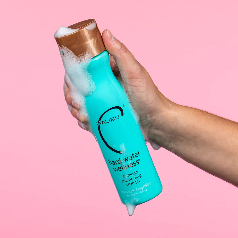 Marque Malibu C Shampoing Eau Dure Etiquette: étiquette claire présentant le soin clarifiant.