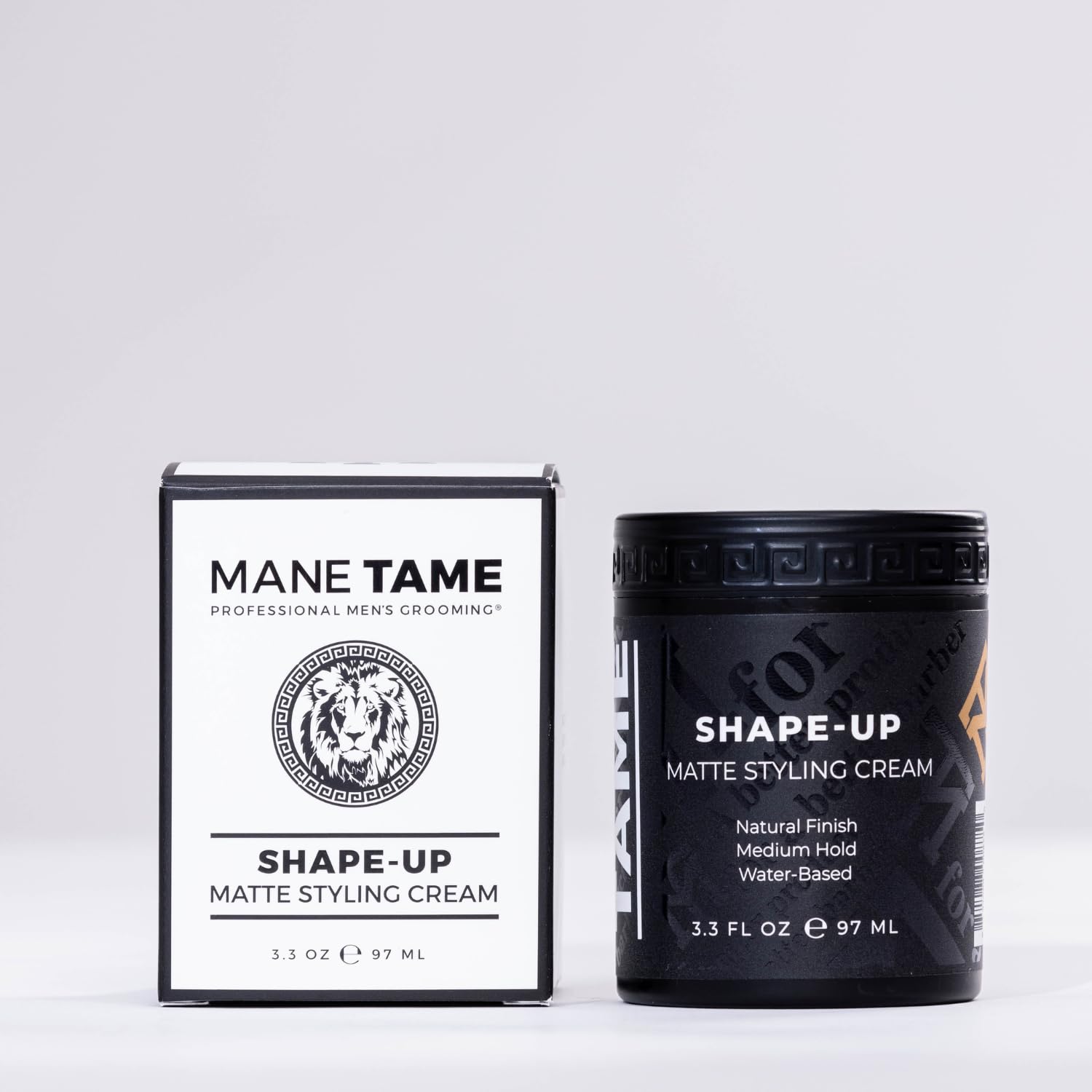 Mane Tame Shape-Up Matte Cream being applied by hand for smooth distribution.