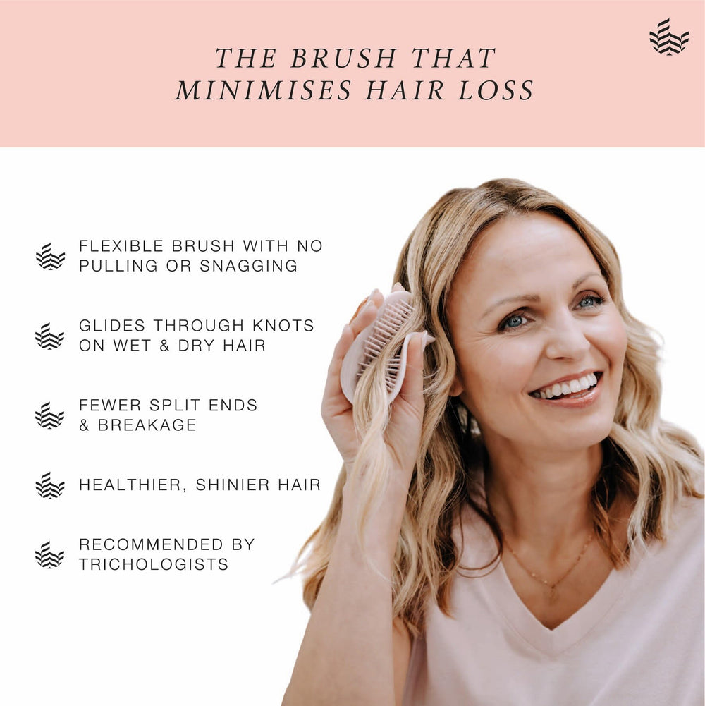 Brosse MANTA Original utilisée sur cheveux humides et secs pour démêlage pratique.