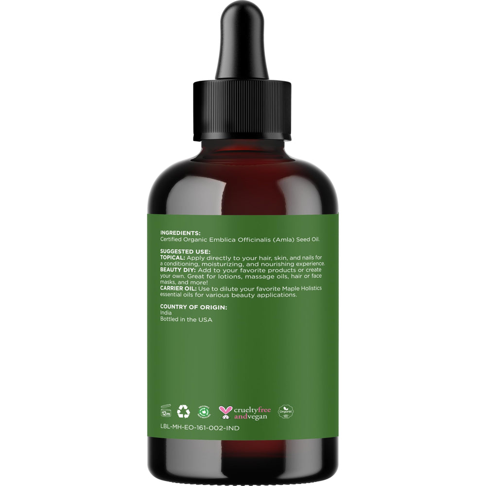 Maple Holistics Amla Oil liquid texture highlighting smooth application.