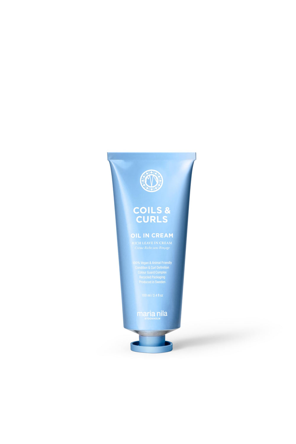 Maria Nila Coils & Curls Oil-In-Cream, bouteille prête pour des boucles hydratées.