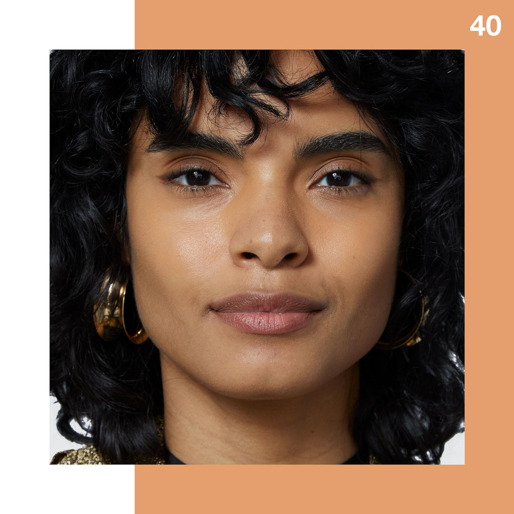 Swatch de la teinte Caramel montrant la couvrance sur peau.
