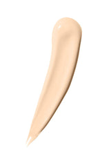 Texture crème dense de Maybelline Master Conceal pour un fini homogène.