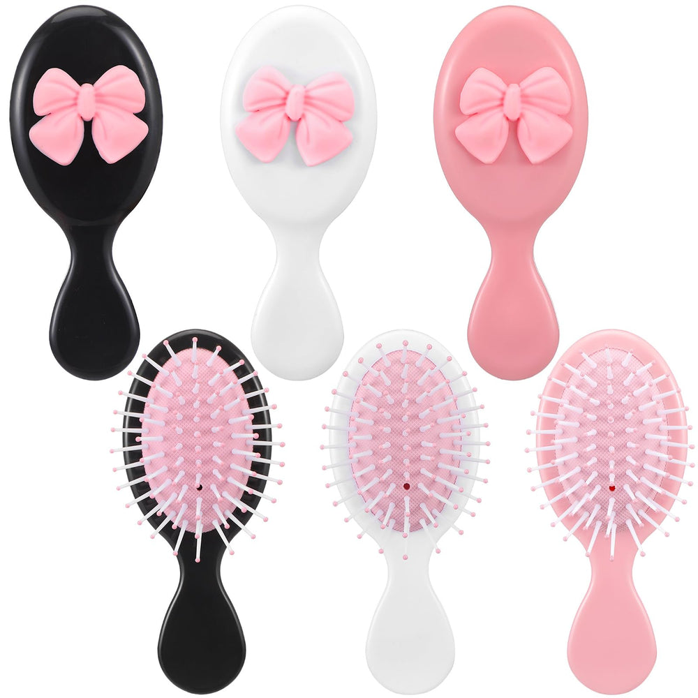 Meanplan mini-brosse-cheveux-noeud rose démêlage en douceur en déplacement