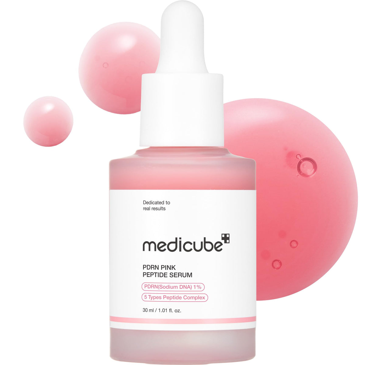 Sérum medicube PDRN peptide rose dans sa bouteille, éclairant le teint.