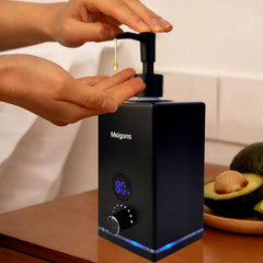 Meigons chauffe-huile massage avec double bouteille, prêt à être utilisé dans un spa.