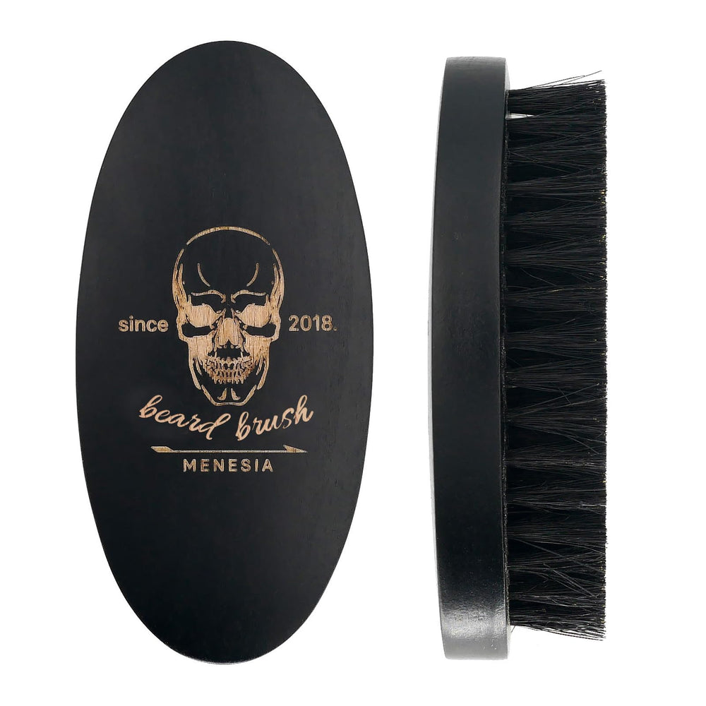 La brosse Menesia barbe bois noir compacte et portable pour voyage.