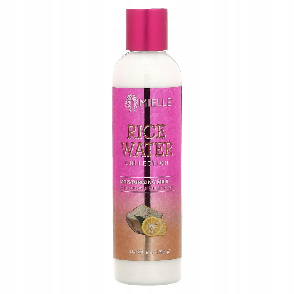 Mielle Eau de Riz – Application sur cheveux bouclés pour douceur et définition.