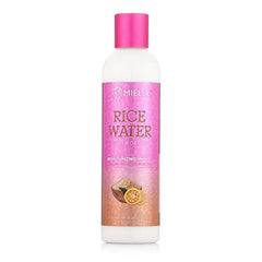 Mielle Lait Hydratant Eau de Riz – Bouteille de 237 ml, hydratation efficace des boucles.