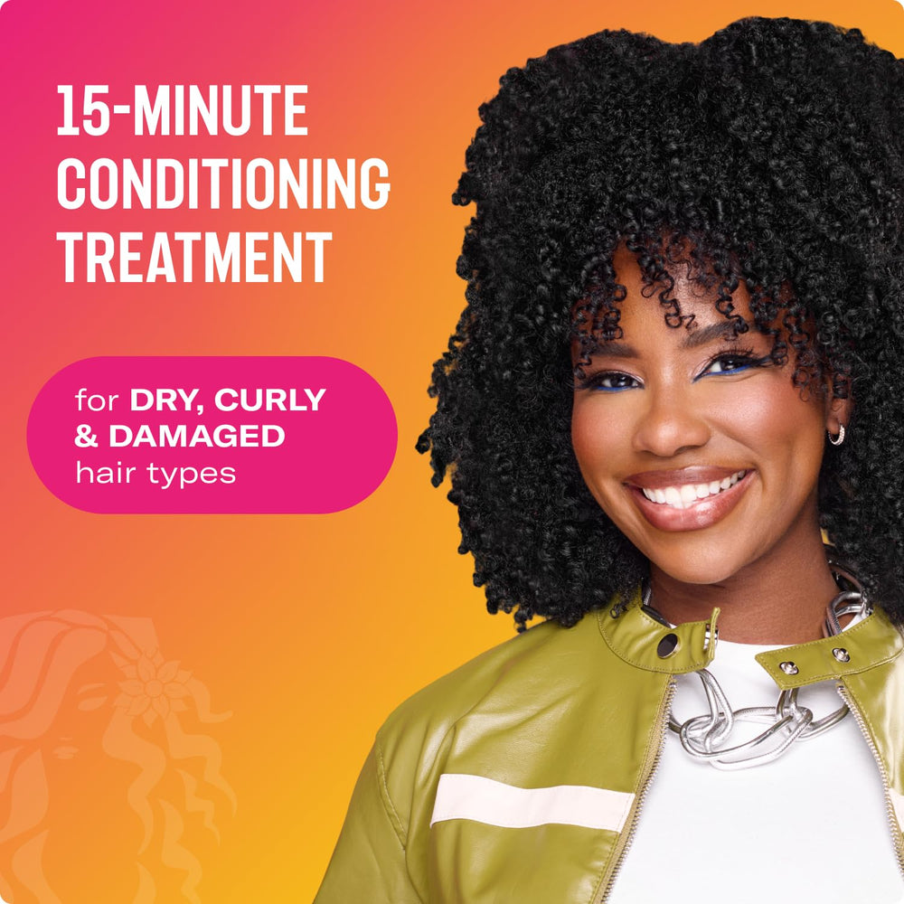 Mielle Organics Babassu et Menthe : texture crème réparatrice pour une action en profondeur.