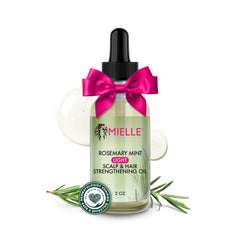 Huile légère Mielle Organics sur la bouteille, revitalise le cuir chevelu et nourrit les longueurs.