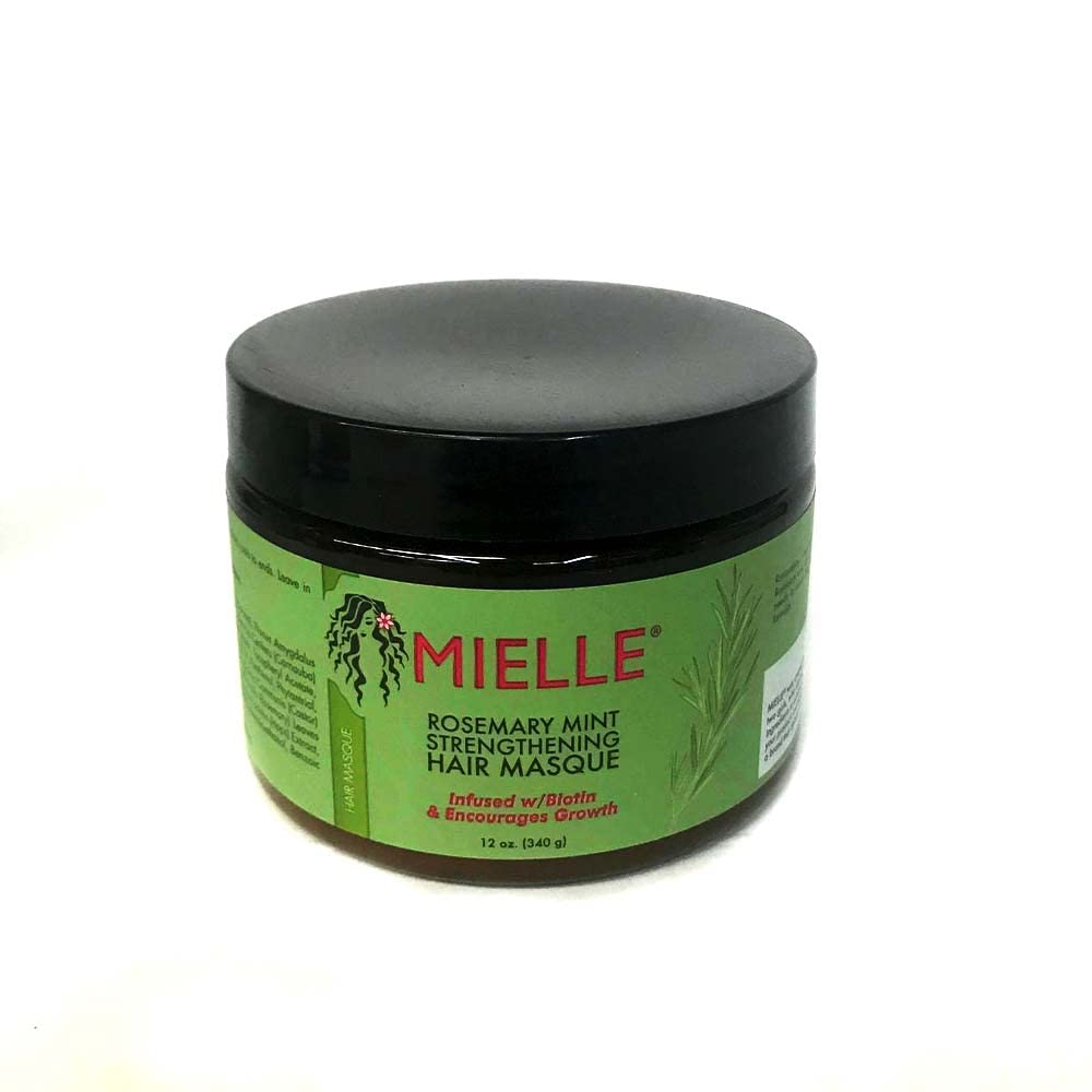 Crème de styling Romarin Menthe, flacon, contrôle les frisottis et apporte une tenue légère.