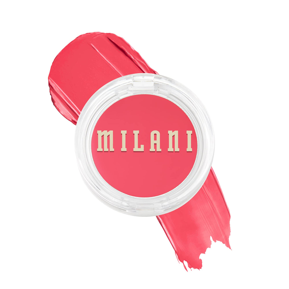 Milani blush crème sur les joues corail crush, flush naturel et lumineux.