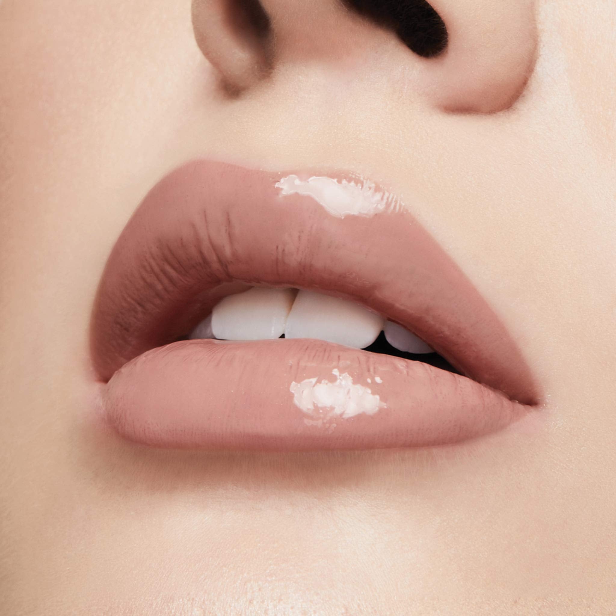 Milani Brillant Lèvres couleur rose doux, look naturel.