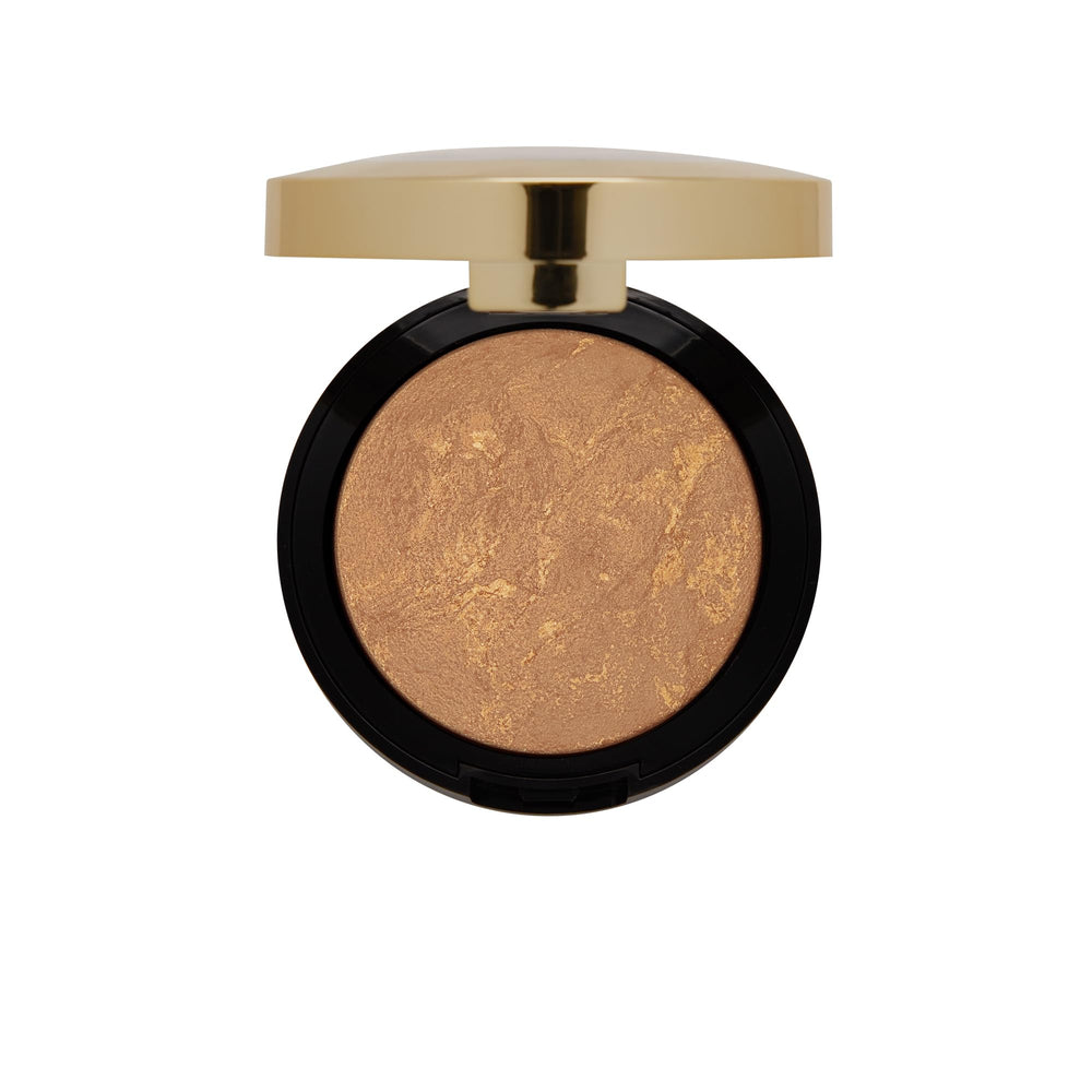 Milani Bronzer Baked Soleil, application ponctuelle pour un effet lumière ciblé.