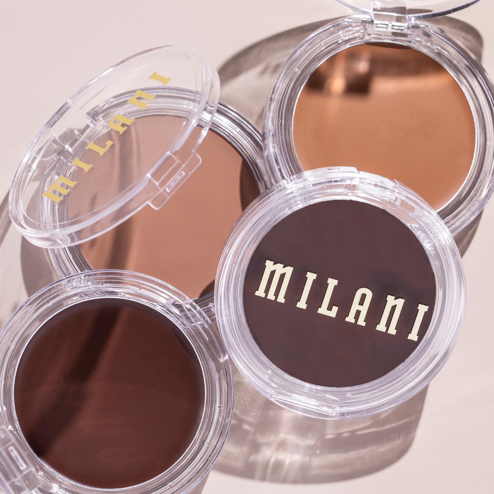 Fini doux et mat sans effet orange avec Milani Cheek Kiss Crème Bronzer.
