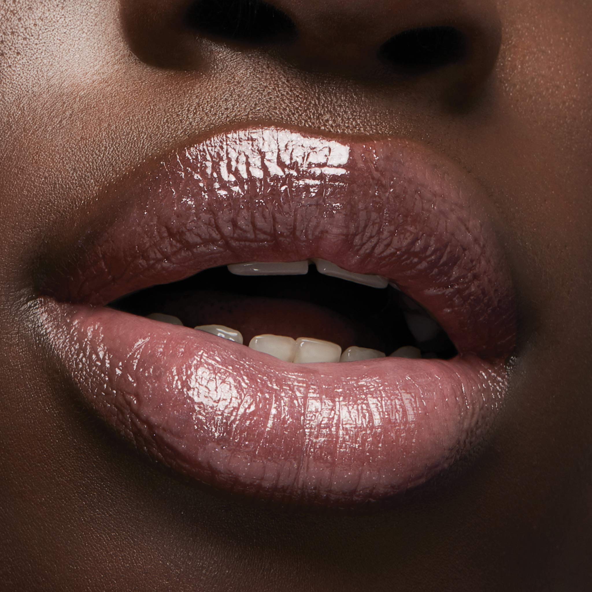 Milani brillant à lèvres teinte neutre polyvalente.