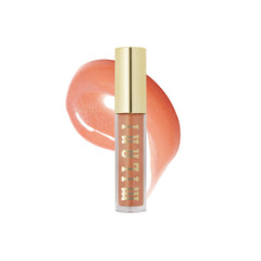 Milani Lip Gloss Keep It Full sur la bouteille tropicale, hydratation visible.