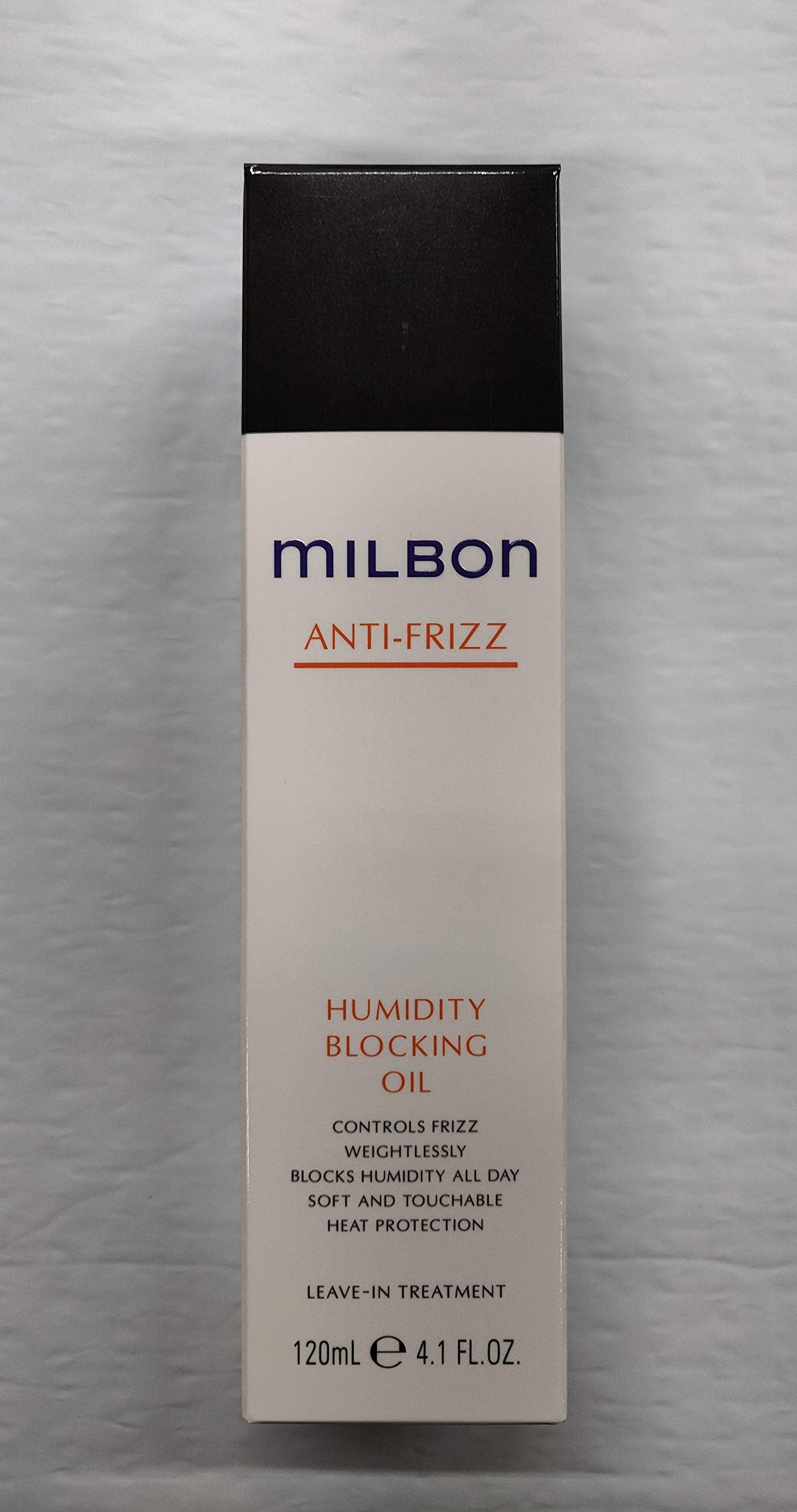 Milbon Huile anti-frisottis – bouteille élégante, contrôle l'humidité et protège contre la chaleur.