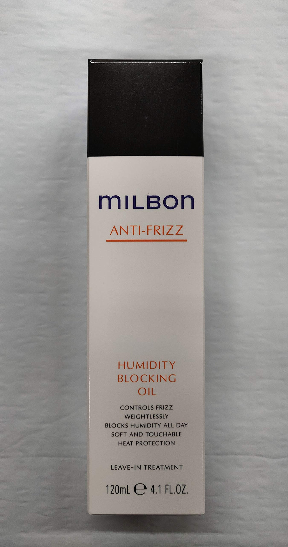 Milbon Huile anti-frisottis – bouteille élégante, contrôle l'humidité et protège contre la chaleur.
