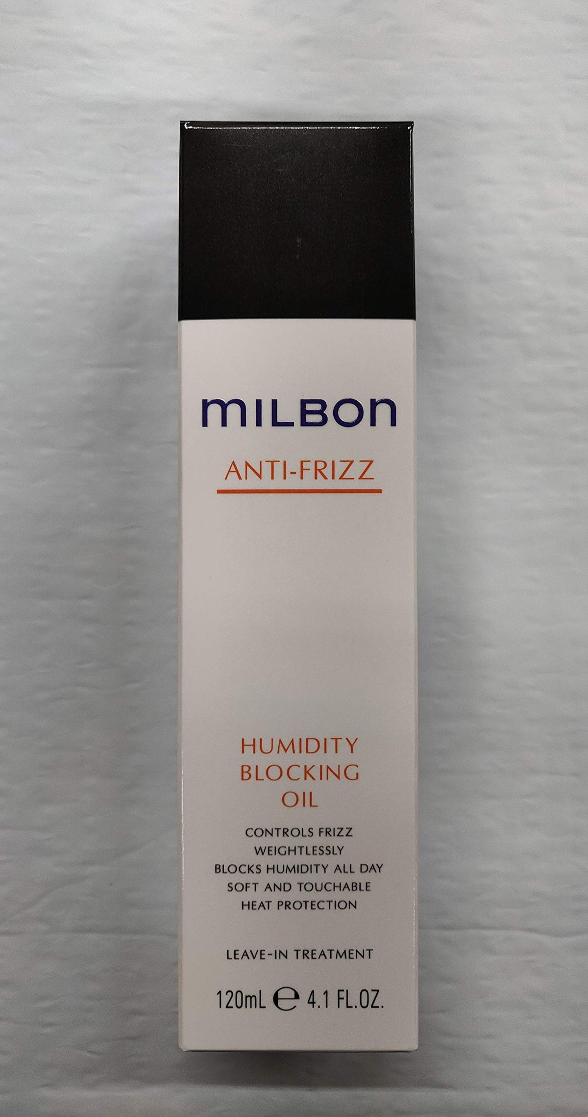 Milbon Huile anti-frisottis – bouteille élégante, contrôle l'humidité et protège contre la chaleur.