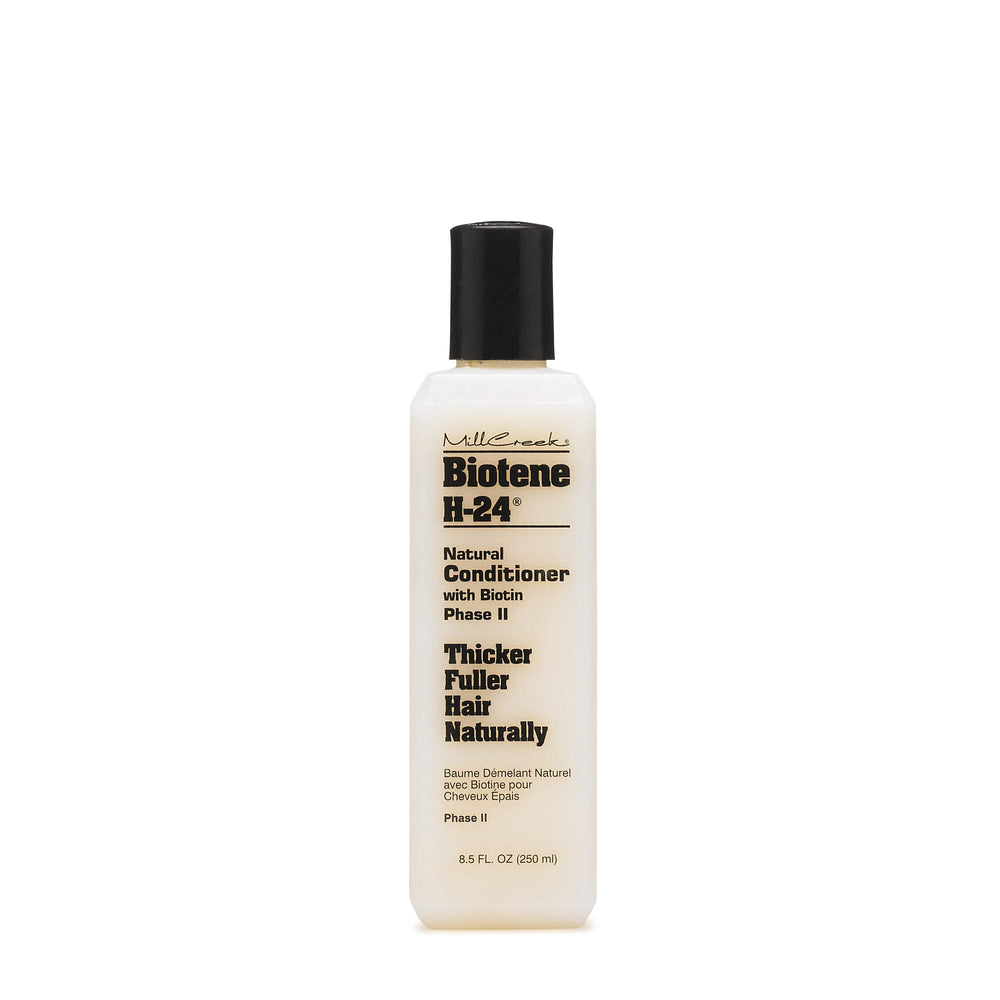 Mill Creek Biotin H24 conditioner bottle for smooth, hydrated hair.