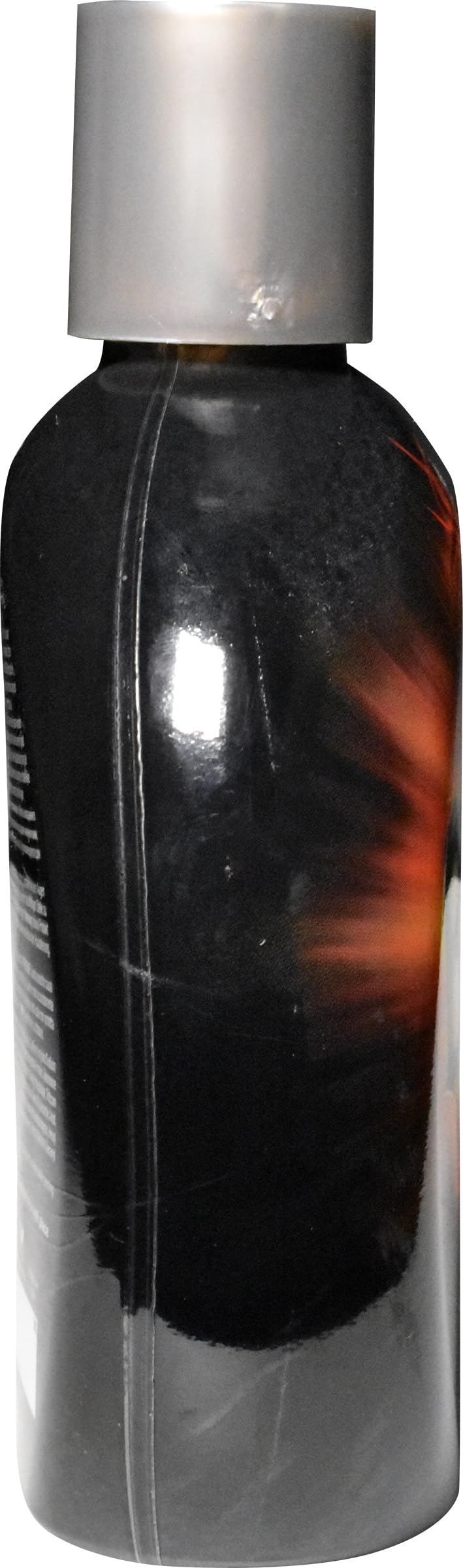 Millennium Tanning Insanely Black 60x – ambiance plage évoquant le bien-être et un teint estival.