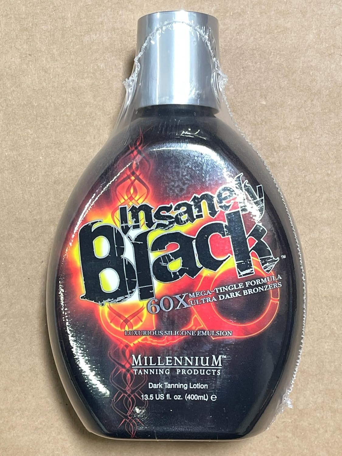 Millennium Tanning Insanely Black 60x – packaging chic et pratique pour vos séances de bronzage.