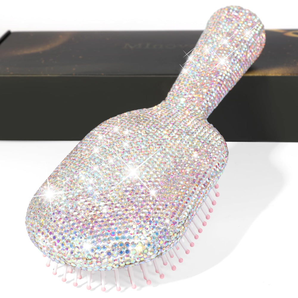 Brosse Minovel palette diamant-cristal pour démêlage en douceur et glamour.