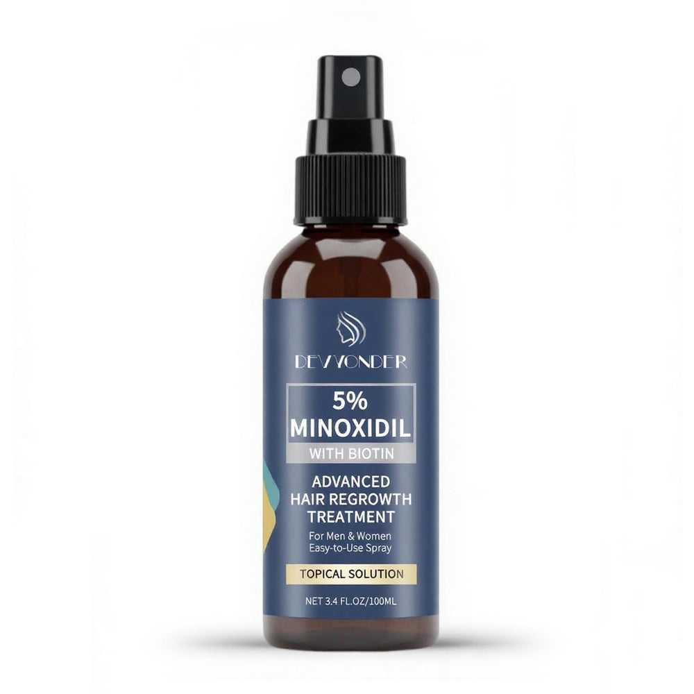 Minoxidil 5% spray pour cheveux: flacon compact prêt à stimuler les follicules capillaires.