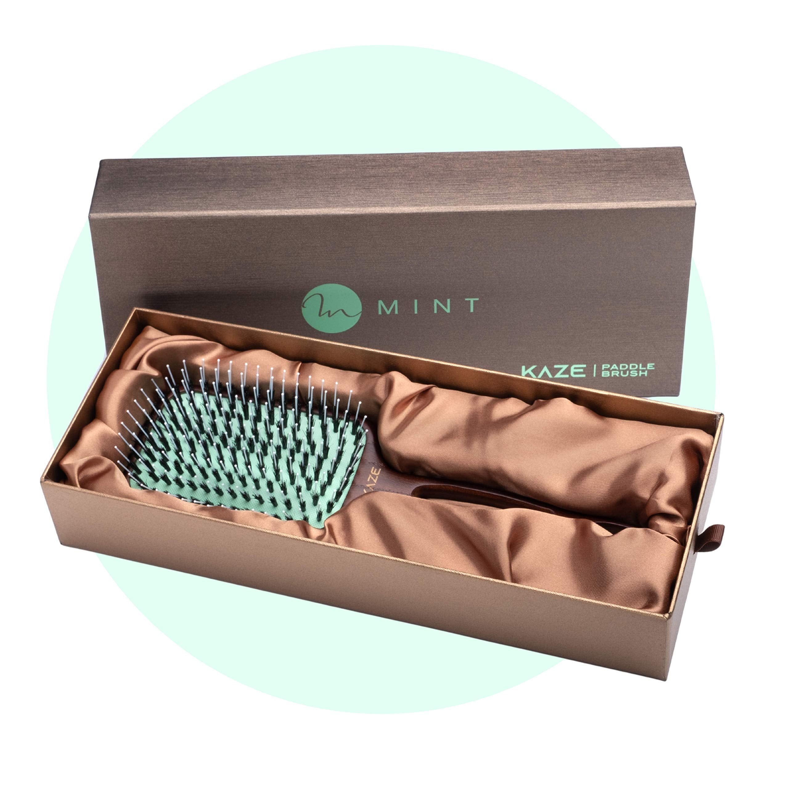 Brosse Mint paddle utilisation quotidienne douce pour tous types de cheveux.