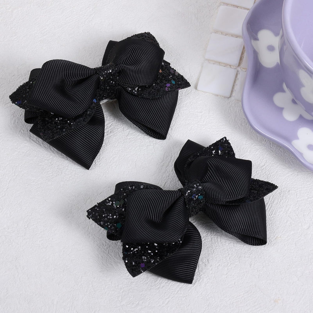 Barrette Miroksh ruban noir brillant paillettes, parfait pour une tenue chic.