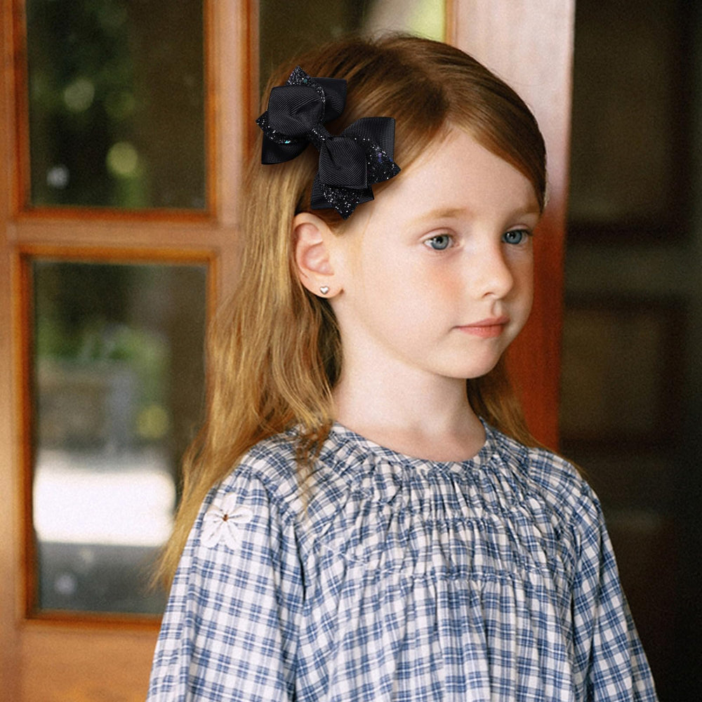 Barrette Miroksh ruban noir étincelant, pour cheveux qui brillent.