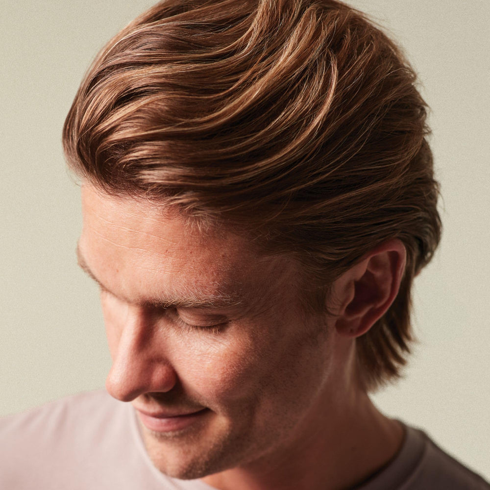 Après coiffage avec MITCH Calibrate Crème, cheveux volumisés et tenus.