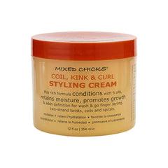 Mixed Chicks Crème coiffante en bouteille, spirales définies et brillance naturelle.
