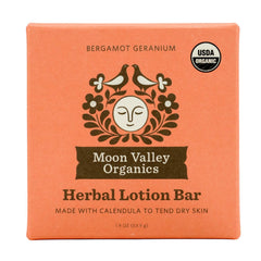 Moon Valley Organics Moon Melt Bar bergamot-géranium pour réconforter la peau sèche.