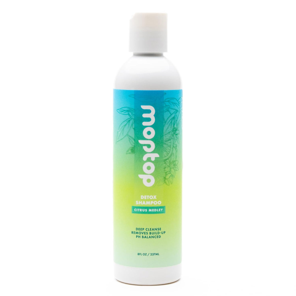 MopTop Detox Shampoo – bouteille agrumes prête à clarifier le cuir chevelu.