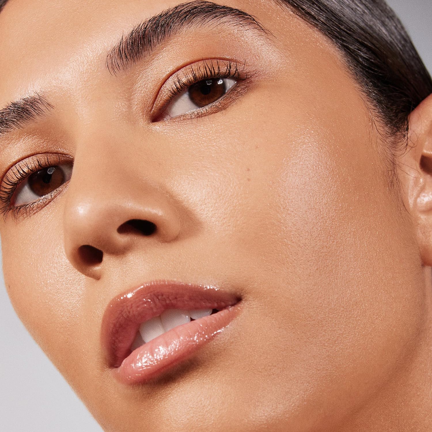MORPHE Lightform Dewy Foundation swatches on skin reveal buildable medium coverage