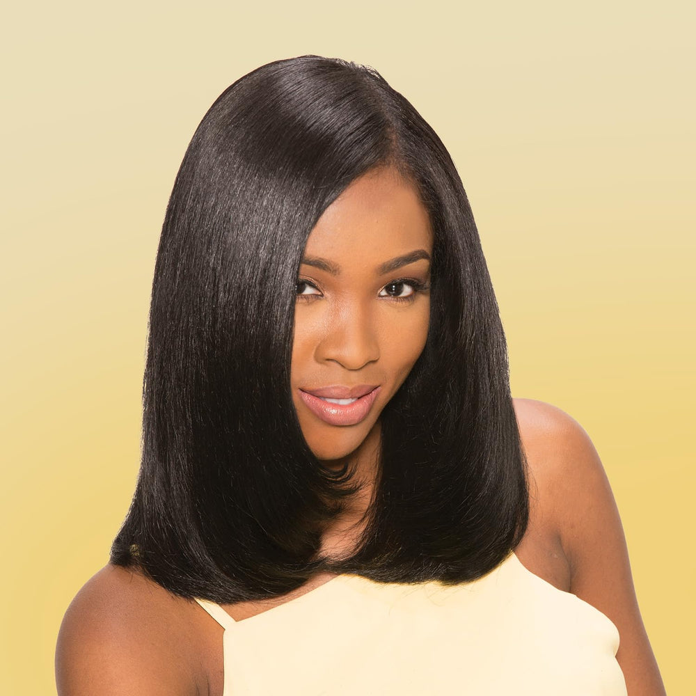 Cheveux propres et souples après rinçage avec Motions.