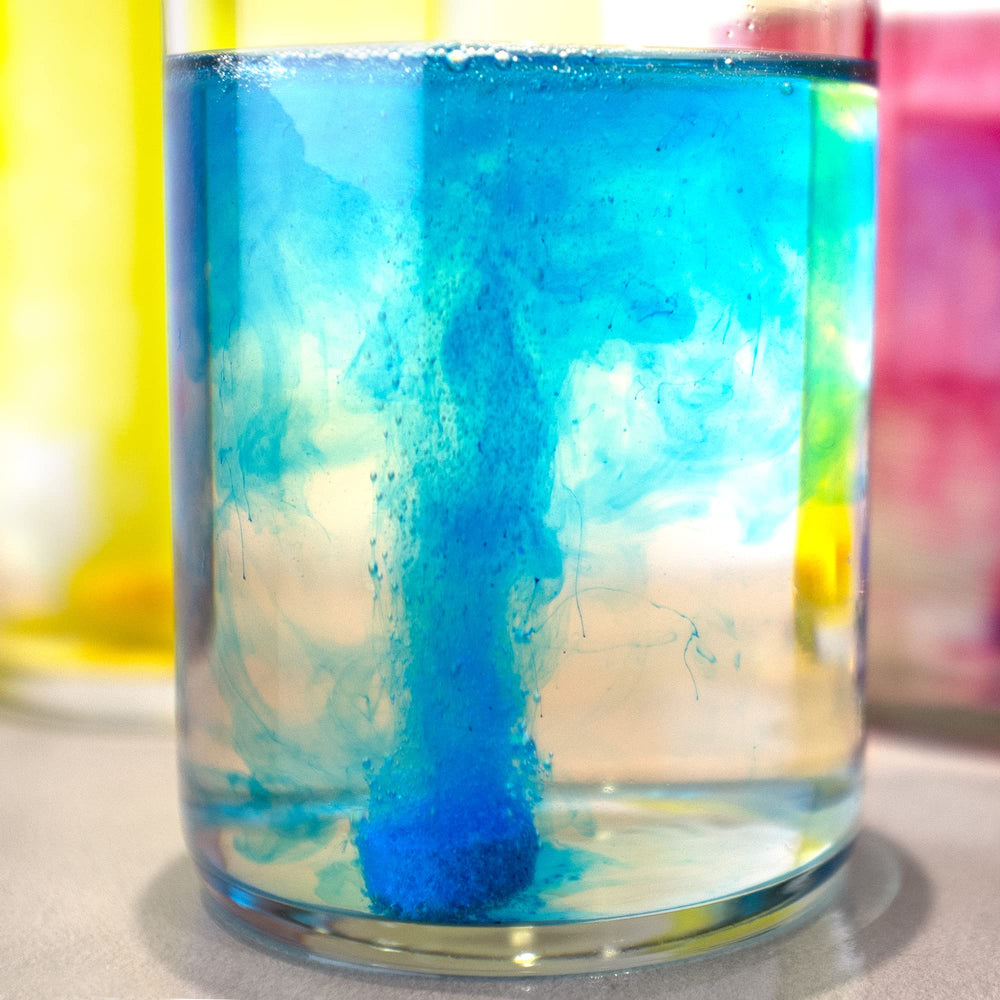 Blue tablet dissolving to produce cool, calming bath shade.