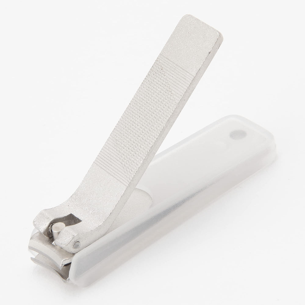 MUJI emballage design minimaliste, rangement élégant sur le plan de travail.