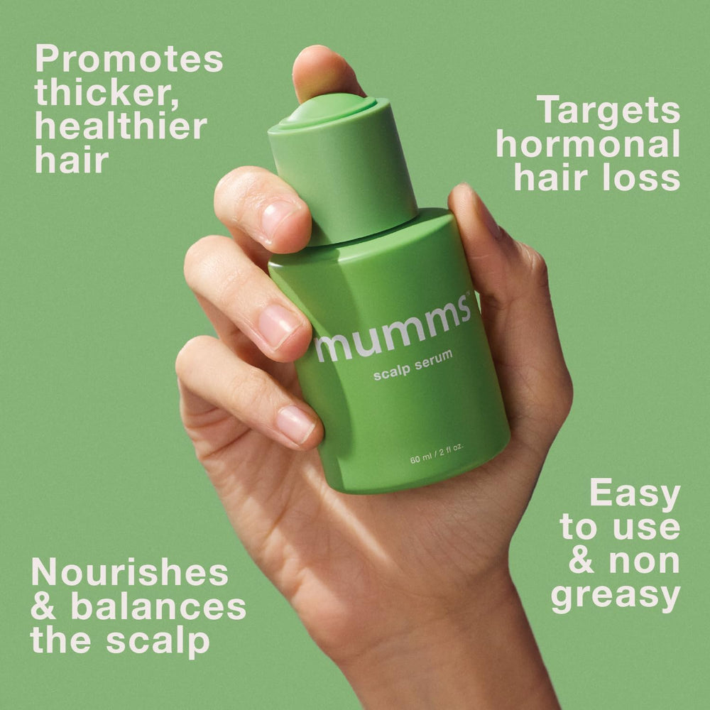 Mumms Serum : gouttes appliquées et massage pour stimuler le cuir chevelu.